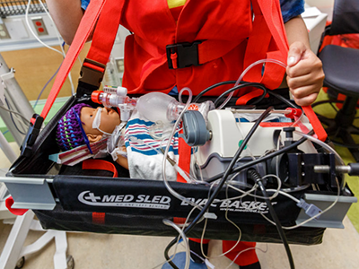 NICU evacuation training baby on a stretcher