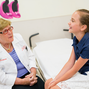 Dr. Laura Tosi talks to a patient