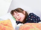 girl with down syndrome sleeping