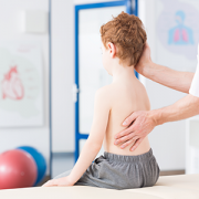 Boy with scoliosis during rehabilitation