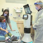 patient meets with ED robot