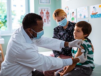 boy getting vaccinated