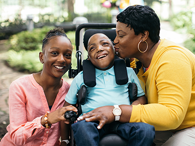 family with child in wheelchair