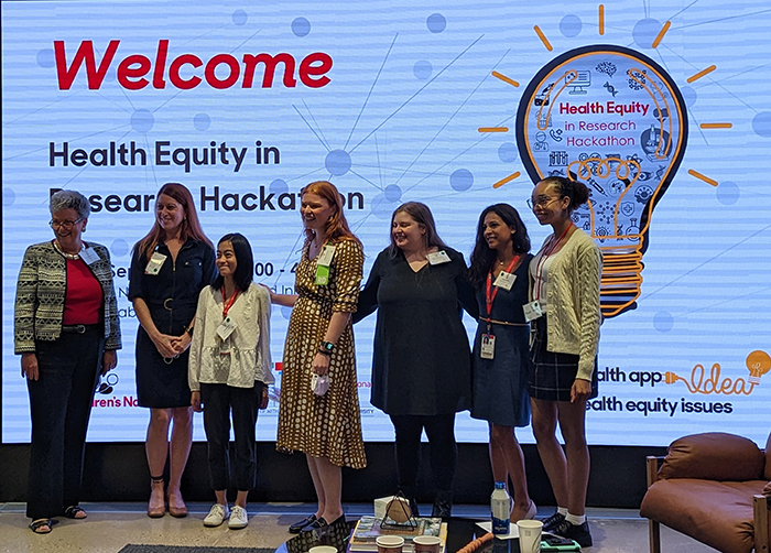 Dr. Lisa Guay-Woodford and the winners of the Health Equity in Research Hackathon