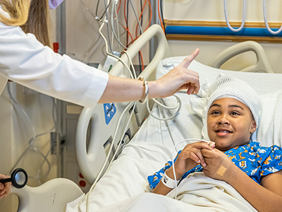 child in hospital bed