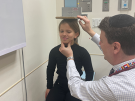 Dr. Andrew Dauber measures Mia's height