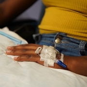 teenager receiving an intravenous infusion