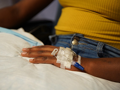 teenager receiving an intravenous infusion