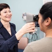 Julia Finkel, M.D., measures a patient's pain with the AlgometRx Nociometer, a pain measurement device to better understand and treat pain.