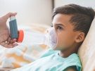 boy with asthma inhaler