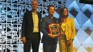 Dr. Marius George Linguraru accepts the IEEE EMBS Distinguished Service Award.