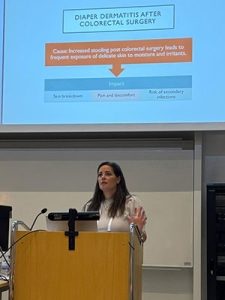 Meghan Mesa, RN, presents at the meeting