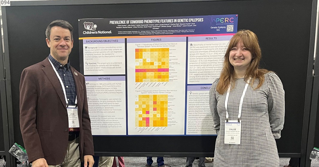 Dr. John Schreiber and Chloe Hooker present research during poster session