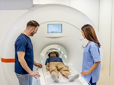 little boy getting a CT scan