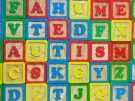 Wooden blocks spelling out the word Autism