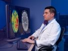 Doctor looking at a brain scan