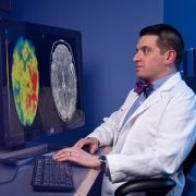 Doctor looking at a brain scan