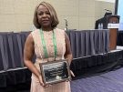 Marva Moxey-Mims with her award