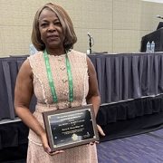 Marva Moxey-Mims with her award