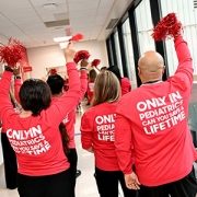 Children's National staff celebrating with pompoms