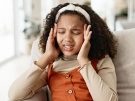 girl experiencing a headache