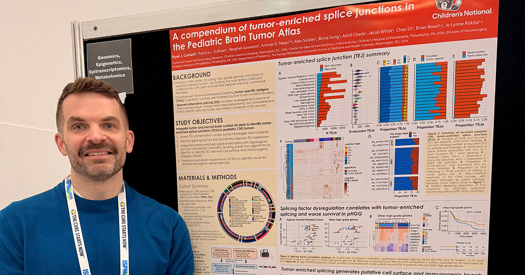 Ryan Corbett, PhD, shares research findings during a poster session at the 22nd International Symposium on Pediatric Neuro-Oncology.