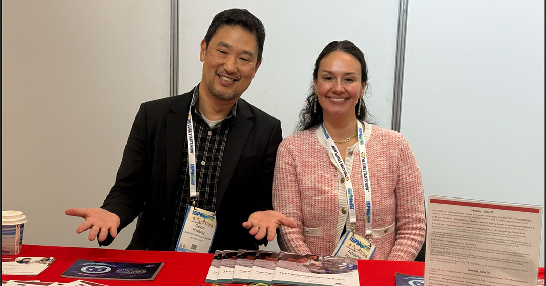 Eugene Hwang, MD, and Adriana Fonseca, MD, represent Children's National at the institution's booth during ISPNO 2026.