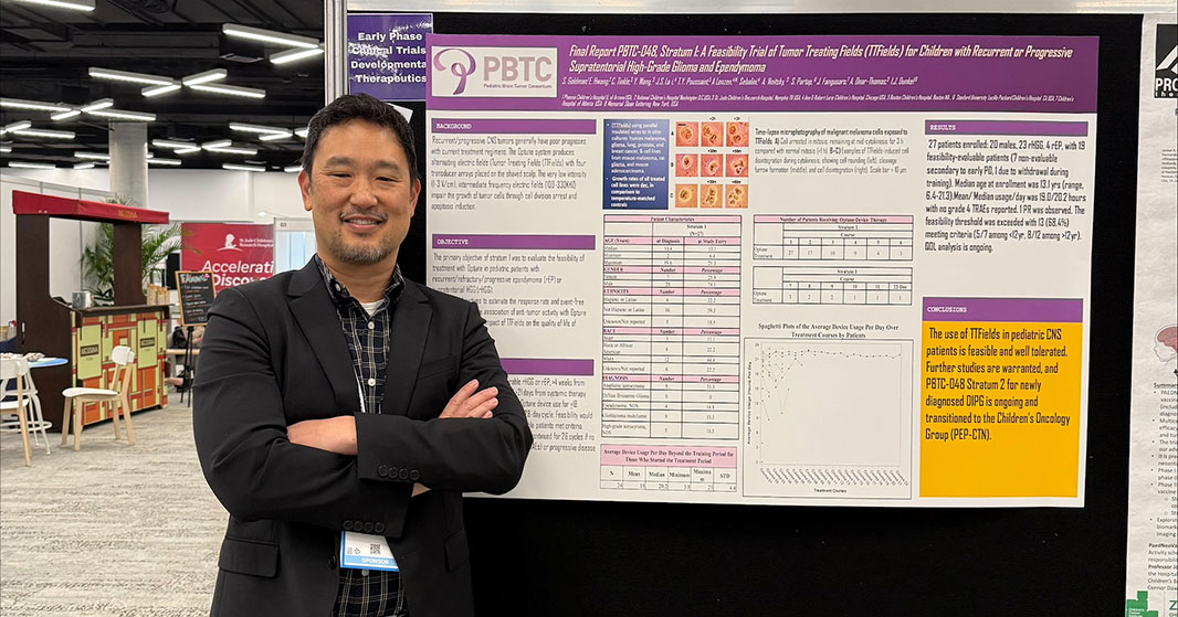 Eugene Hwang, MD, presenting emerging research at a poster session at ISPNO 2026.